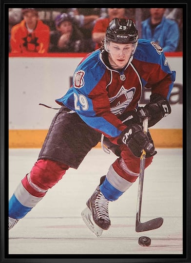 Nathan MacKinnon Colorado Avalanche Framed 20" x 29" Skating with Puck Canvas 22.5" x 31.5"